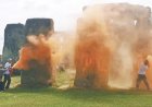 Iconic Stonehenge monument orange spray-painted by climate protestors