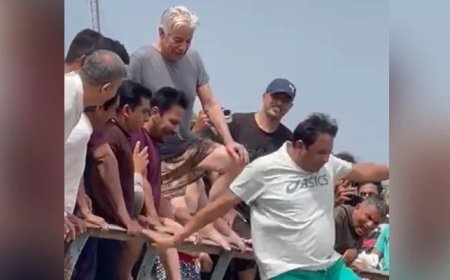 Khawaja Asif beats the heat by dipping in Sialkot's canal