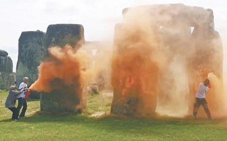 Iconic Stonehenge monument orange spray-painted by climate protestors